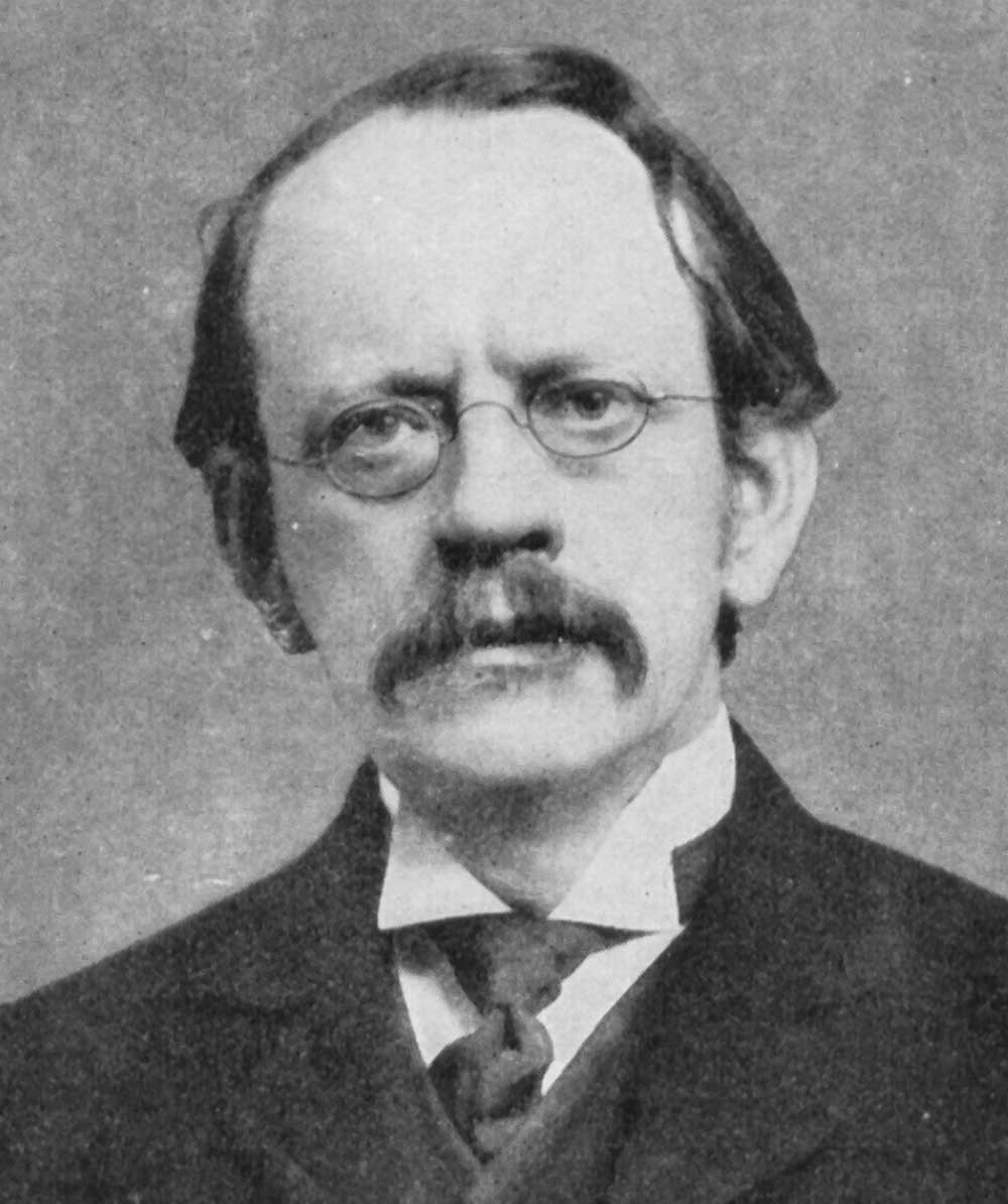 Joseph John Thomson (1856-1940). From Wikimedia Commons, public domain.
Thomson refined the idea of the atomic model: electrons moving within the atom, though the atom is still neutral in charge.