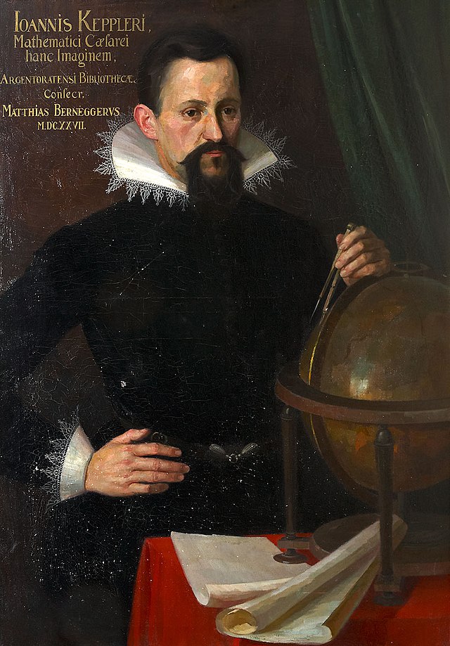 Painted portrait of Johanned Keppler. He has dark hair and a thick beard. Next to him, there is a table with a red table cloth, with a globe on it. Keppler rests his hand on the globe, while holding a divider caliper. 