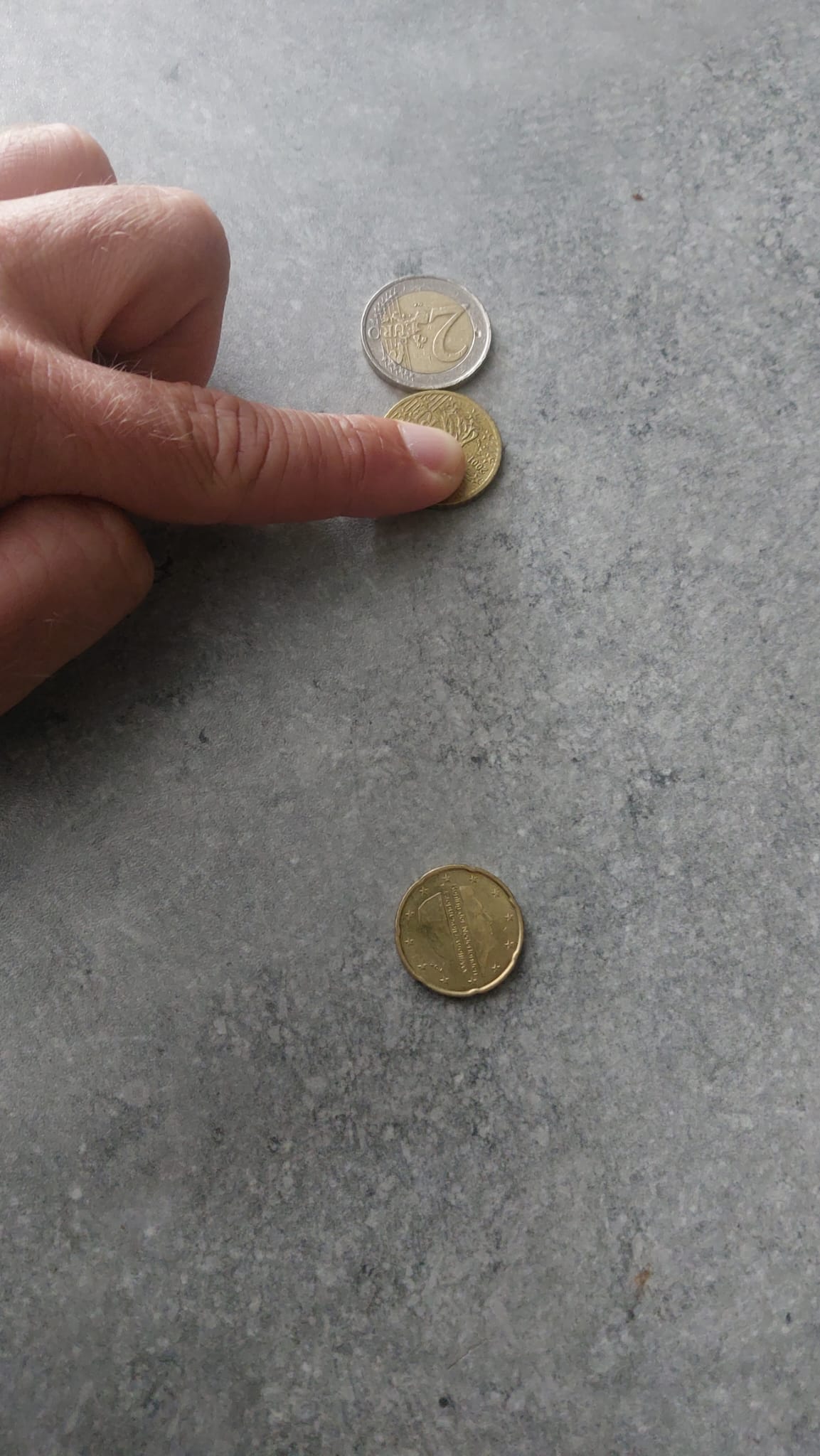 Try varying the setup—for example, using a heavier coin or a lighter one as the target—and observe the effects.