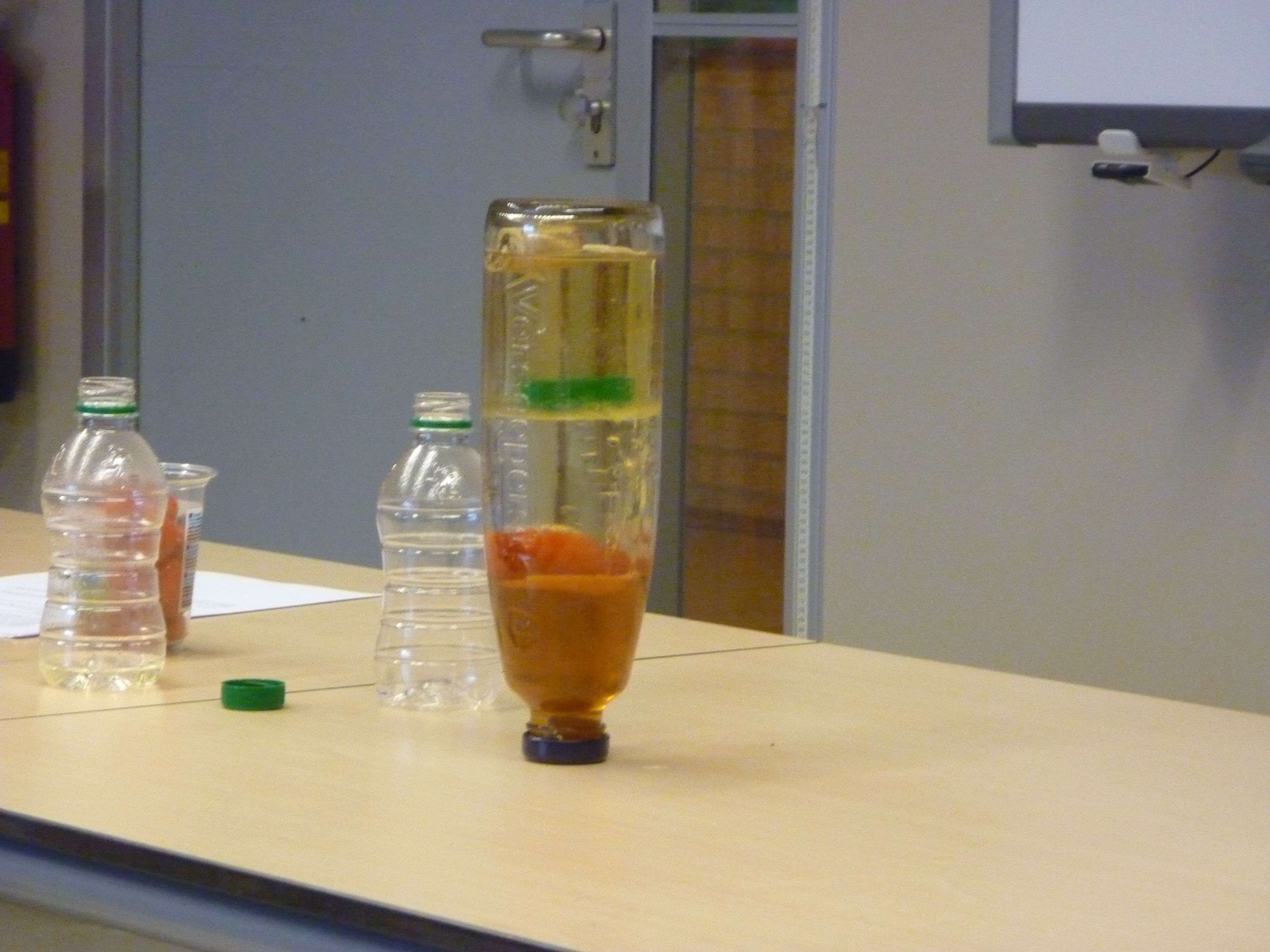 Various liquids stacked upon each other.