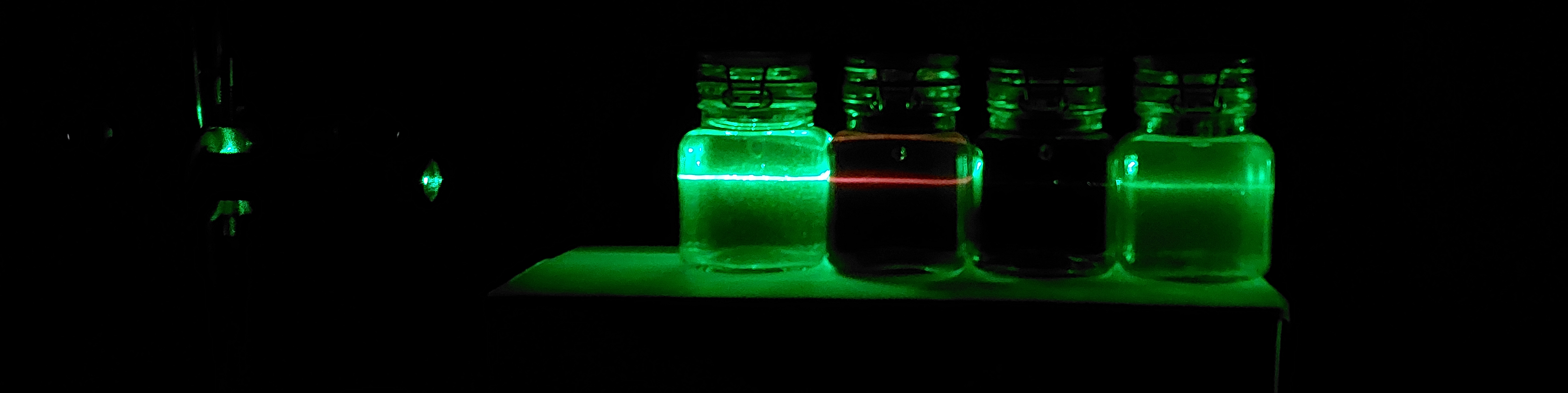 the same picture with lights of, showing the changing colors in the various jars.